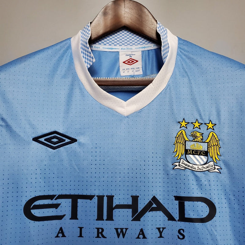Camiseta retro de aficionado del Manchester City (local 11/12) para hombre - Azul