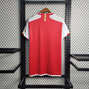 Camiseta de aficionado Adidas para hombre del Arsenal I 23/24: roja y dorada.
