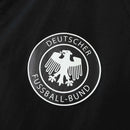 Chaqueta de doble cara alemana en blanco y negro, talla L 2025