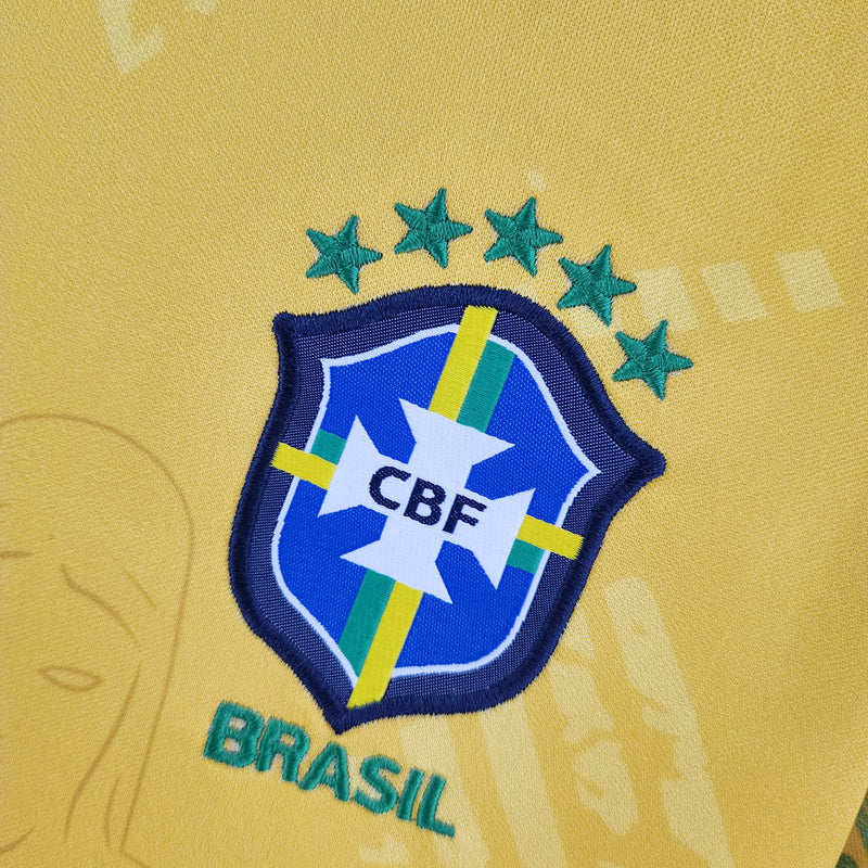 Camiseta Nike para mujer, edición especial de la selección brasileña, con el Cristo Redentor como fan - Amarilla
