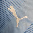 Camiseta y pantalón corto azul del Manchester City 23/24 para niño