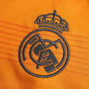 Camiseta y pantalón corto visitante del Real Madrid II 24/25 I - Naranja