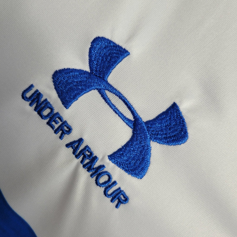 Camiseta de aficionado de la Universidad Católica 23/24 para hombre de Under Armour - Blanca