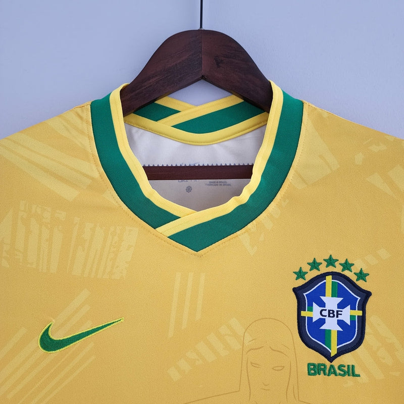 Camiseta Nike para mujer, edición especial de la selección brasileña, con el Cristo Redentor como fan - Amarilla