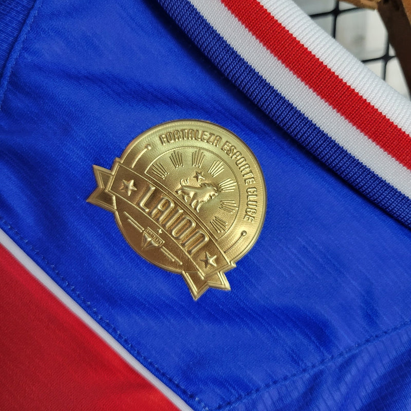 Camiseta de aficionado del León de Fortaleza I 23/24 para hombre - Roja y azul